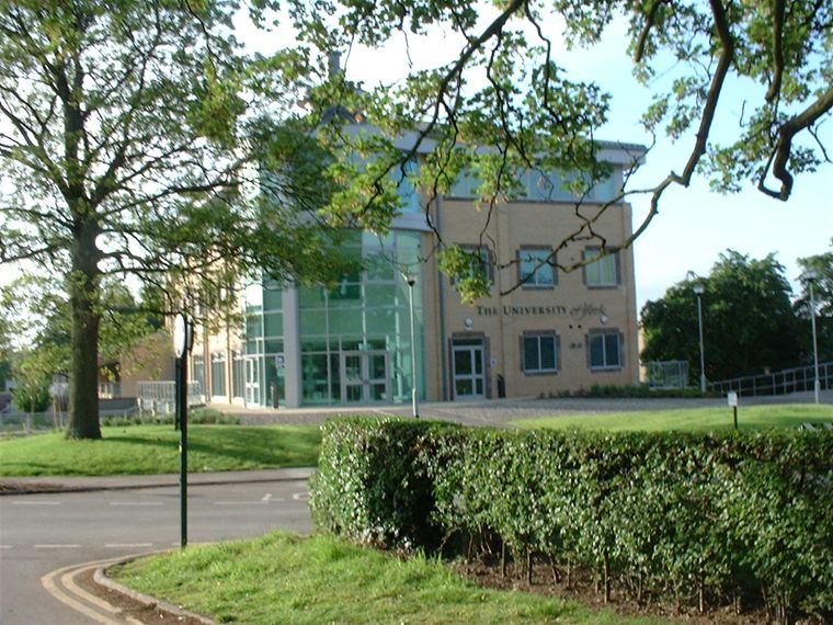 new building in the middle with a shop underneath