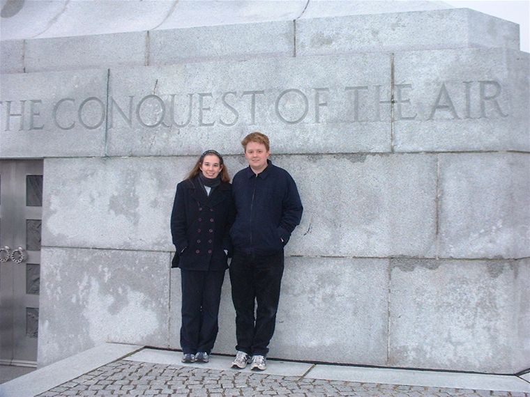 At the foot of the memorial