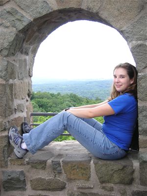 Audrey; on top of some building somewhere.