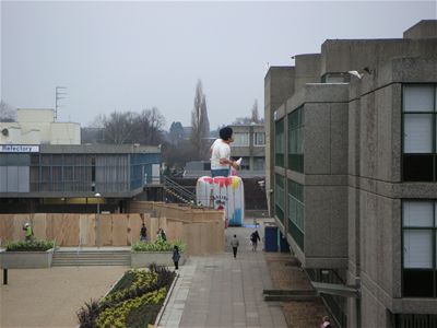 An exceptionally large gentleman advertising Malibu